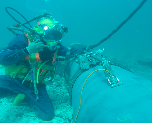A Sonomatic diver deploying Sonomatic's Nautilus machinery